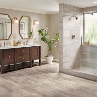 Design ideas for a large transitional master bathroom in Other with shaker cabinets, dark wood cabinets, an alcove shower, gray tile, porcelain tile, beige walls, vinyl floors, an undermount sink, recycled glass benchtops, beige floor and a hinged shower door.
