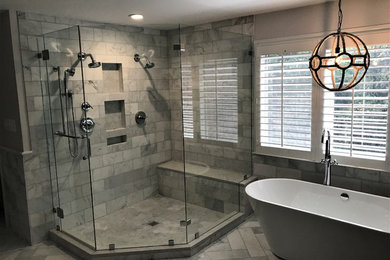 Inspiration for a large modern master bathroom remodel in DC Metro with a hinged shower door