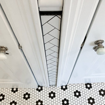 Attention to Detail: White Crown Molding with Cut Herringbone Tile