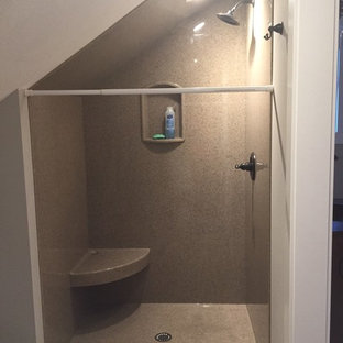 Bathroom - mid-sized rustic 3/4 medium tone wood floor and brown floor bathroom idea in Milwaukee with furniture-like cabinets, dark wood cabinets, a two-piece toilet, gray walls, an integrated sink and solid surface countertops