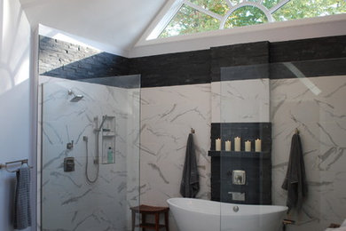 Bathroom - large master bathroom idea in Cleveland with raised-panel cabinets and black cabinets