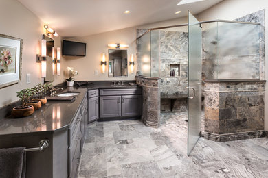 Transitional multicolored tile corner shower photo in Milwaukee with an undermount sink, flat-panel cabinets, gray cabinets and beige walls