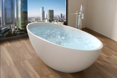 Example of a mid-sized minimalist master freestanding bathtub design in San Francisco