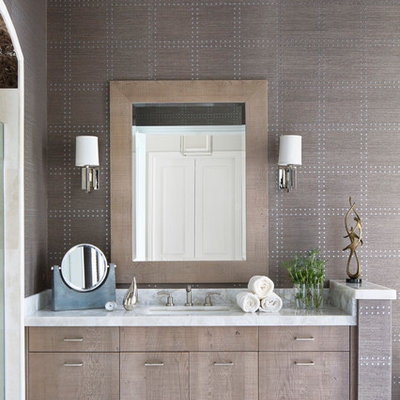 Inspiration for a mid-sized transitional master bathroom remodel in Miami with flat-panel cabinets, light wood cabinets, gray walls, an undermount sink, marble countertops and gray countertops