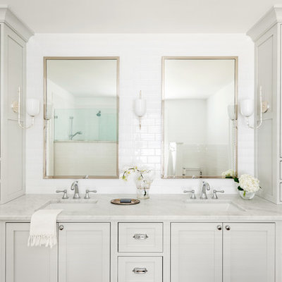 Bathroom - mid-sized traditional master white tile and subway tile bathroom idea in Other with recessed-panel cabinets, gray cabinets, a one-piece toilet, white walls, an undermount sink, marble countertops and white countertops