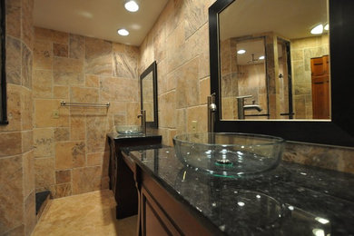 This is an example of a small contemporary bathroom in Other with multi-coloured walls and travertine flooring.