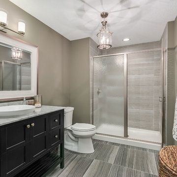 Basement Bathroom with Gray Tile
