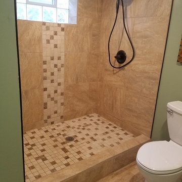 basement bathroom with walk in shower
