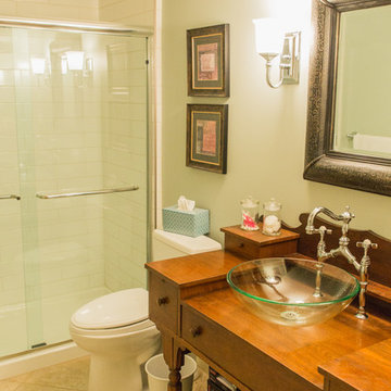 Basement full bath with sliding glass shower door