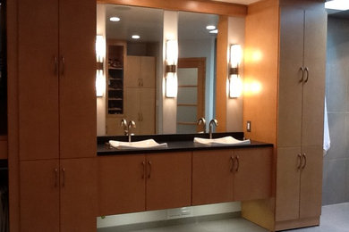 Large trendy master bathroom photo in Philadelphia with flat-panel cabinets and light wood cabinets