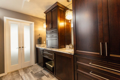 Example of a mid-sized classic master bathroom design in Other with flat-panel cabinets, dark wood cabinets and quartz countertops