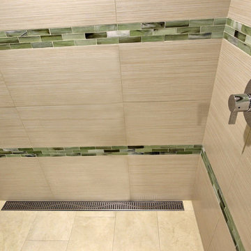 Bath: Linear drain in porcelain and matte glass shower