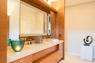 Freestanding bathtub - mid-sized modern master freestanding bathtub idea in San Diego with an integrated sink
