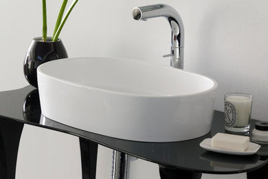 Inspiration for a contemporary bathroom remodel in Dallas with a vessel sink