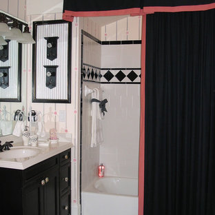 Inspiration for a timeless black and white tile bathroom remodel in Charlotte