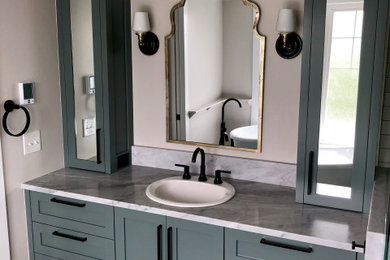 Example of a large trendy master gray tile ceramic tile, multicolored floor and single-sink bathroom design in Seattle with shaker cabinets, turquoise cabinets, beige walls, a drop-in sink, quartzite countertops, gray countertops and a built-in vanity