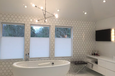 Inspiration for a mid-sized contemporary master white tile and porcelain tile porcelain tile and white floor bathroom remodel in New York with flat-panel cabinets, white cabinets, a one-piece toilet, a vessel sink, quartz countertops, a hinged shower door and white walls