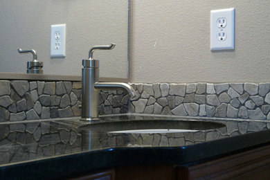 Large elegant bathroom photo in Seattle with granite countertops