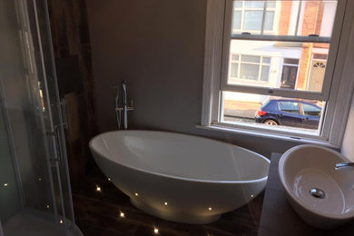 Photo of a rustic bathroom in Sussex.