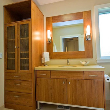 Bathroom cabinetry with metal legs, wood mirror