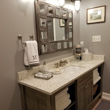 Bathroom cabinets with custom mirror and lighting frames