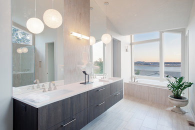 Inspiration for a mid-sized master bathroom remodel in Los Angeles with white countertops