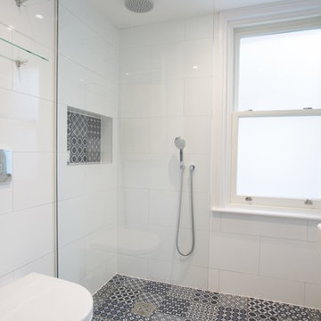 Guest shower room with mosaic floor