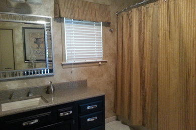 Example of a classic bathroom design in Other