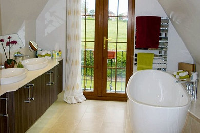 Medium sized contemporary bathroom in Other with a freestanding bath.