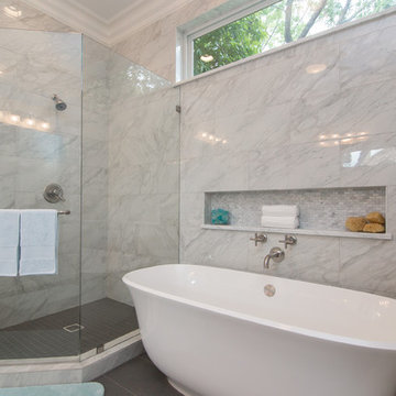 Bathroom | Elegant Custom Cabinets | Marble Tile & Freestanding Tub