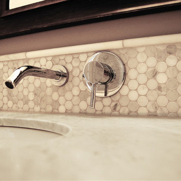 Bathroom faucet with carrera penny tile backsplash