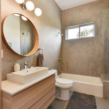 Bathroom full of natural wood, white walls and abundant light