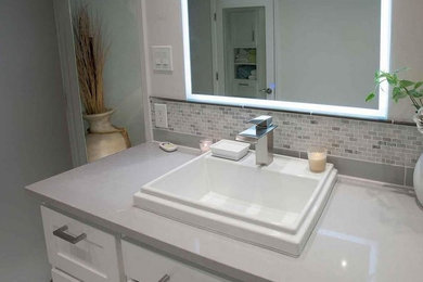 Example of a transitional bathroom design in Other