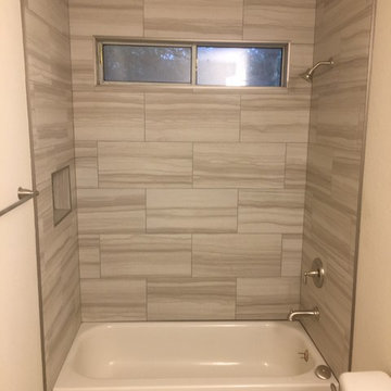 Bathroom - Gray 12" x 24" Tile Brick Pattern Tub Surround / Santa Cecilia Vanity