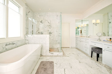 Design ideas for a traditional bathroom in Dallas with shaker cabinets, white cabinets, a freestanding bath, a corner shower and white tiles.