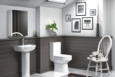 This is an example of a medium sized contemporary family bathroom in Cheshire with a two-piece toilet and a pedestal sink.