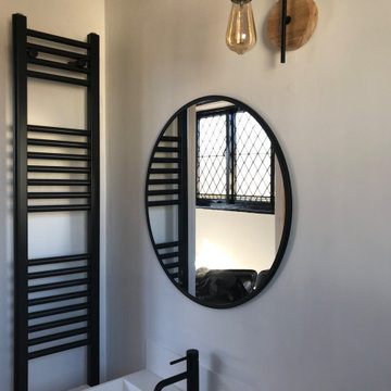 Mirror, wall light and towel radiator added