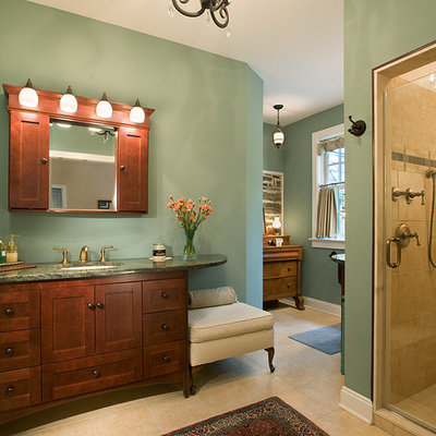 Example of a large classic master limestone floor and beige floor alcove shower design in Philadelphia with an undermount sink, shaker cabinets, dark wood cabinets, green walls, a two-piece toilet, granite countertops, a hinged shower door and green countertops