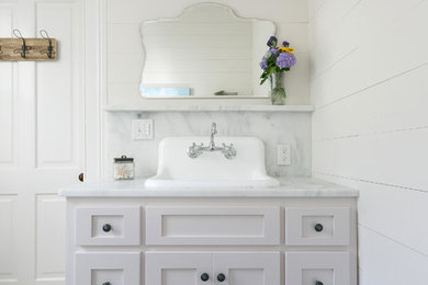 Country bathroom photo in Charleston with shaker cabinets, gray cabinets, white walls and a drop-in sink