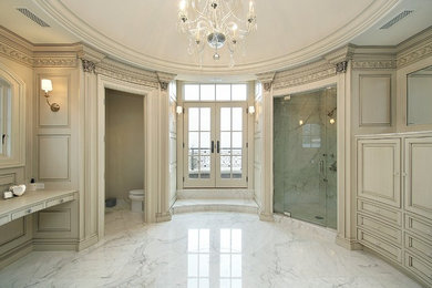 Example of a classic master white tile and stone tile marble floor corner shower design in Atlanta with beaded inset cabinets, marble countertops and a one-piece toilet