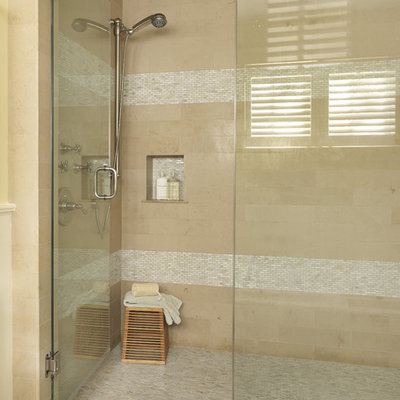 Example of a trendy mosaic tile corner shower design in Boston with a niche