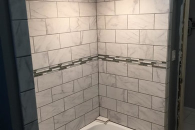 Example of a small trendy gray tile bathroom design in Boston