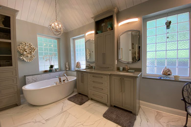 Inspiration for a large farmhouse master white tile and porcelain tile porcelain tile, white floor, double-sink and shiplap ceiling bathroom remodel in Other with shaker cabinets, gray cabinets, a bidet, blue walls, an undermount sink, quartz countertops, a hinged shower door, gray countertops, a niche and a built-in vanity