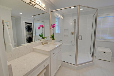 Example of a mid-sized transitional 3/4 white tile and subway tile porcelain tile corner shower design in Other with beaded inset cabinets, white cabinets, white walls, an undermount sink and granite countertops