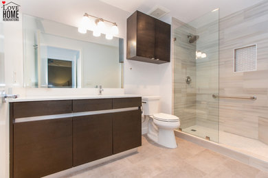Inspiration for a large modern 3/4 beige tile and wood-look tile single-sink, ceramic tile and beige floor bathroom remodel in Los Angeles with flat-panel cabinets, brown cabinets, white countertops, a built-in vanity, a two-piece toilet, white walls and an undermount sink