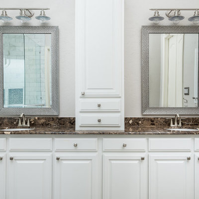 Inspiration for a large modern master white tile and marble tile porcelain tile and beige floor bathroom remodel in Dallas with shaker cabinets, white cabinets, a one-piece toilet, white walls, an integrated sink and marble countertops