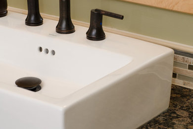 Inspiration for a transitional bathroom remodel in Raleigh with a vessel sink