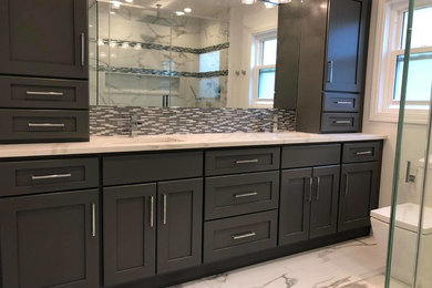 Trendy bathroom photo in Chicago with shaker cabinets and gray cabinets