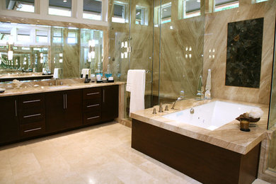 Inspiration for a large contemporary master mirror tile porcelain tile corner shower remodel in Other with flat-panel cabinets, dark wood cabinets, an undermount tub, beige walls, an undermount sink and marble countertops