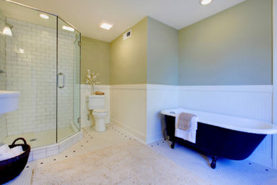 Bathroom - white tile and mosaic tile mosaic tile floor bathroom idea in Raleigh with a console sink, white cabinets and green walls